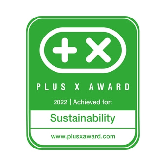 Plus X Award 2022 for Sustainability, green logo with white text and symbols