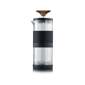 Coffee press with wooden handle and black band, glass container.