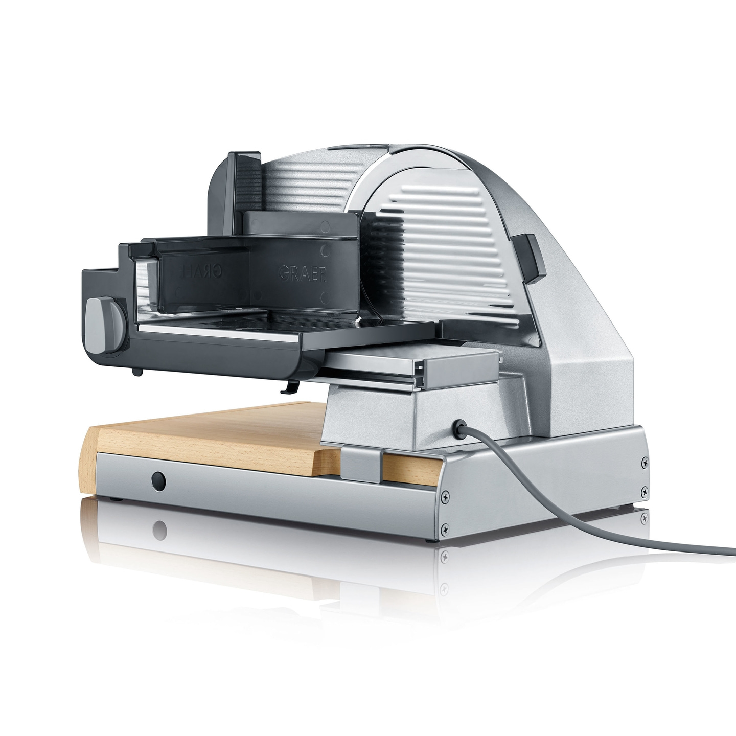 Silver Graef food slicer with wooden board and power cord isolated on white background