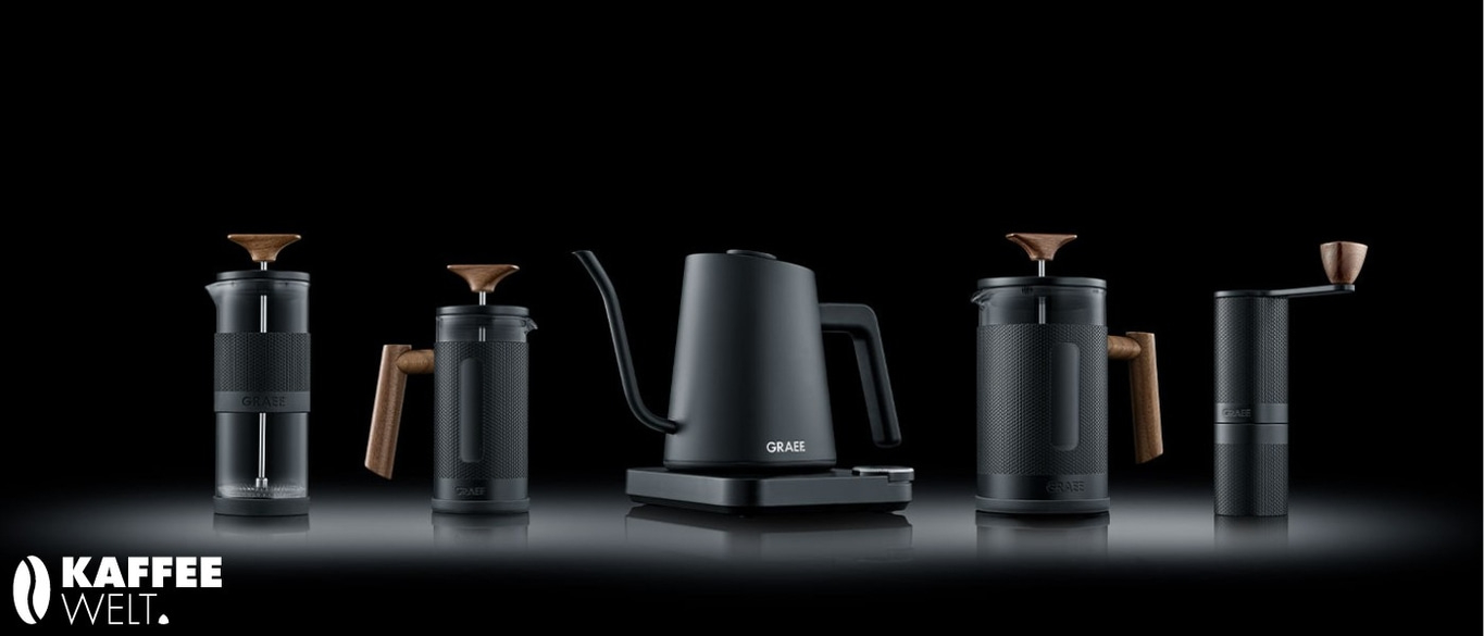 Coffee machine set with wooden details on black background, GRAEF brand.