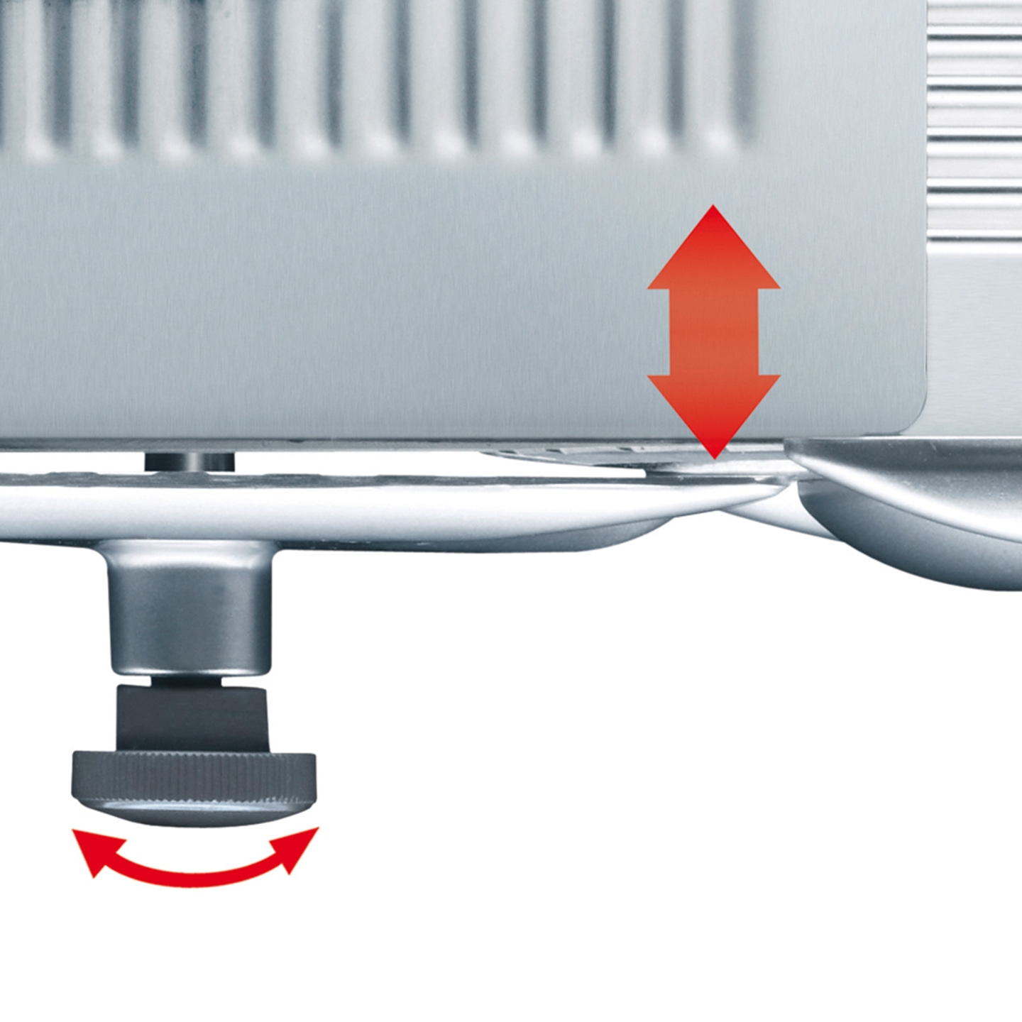Close-up of a device with arrows indicating adjustment and rotation.