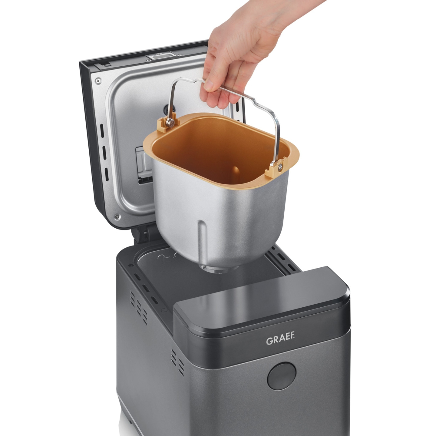 Bread maker with removable container, hand holding handle, open lid, GRAEF logo visible