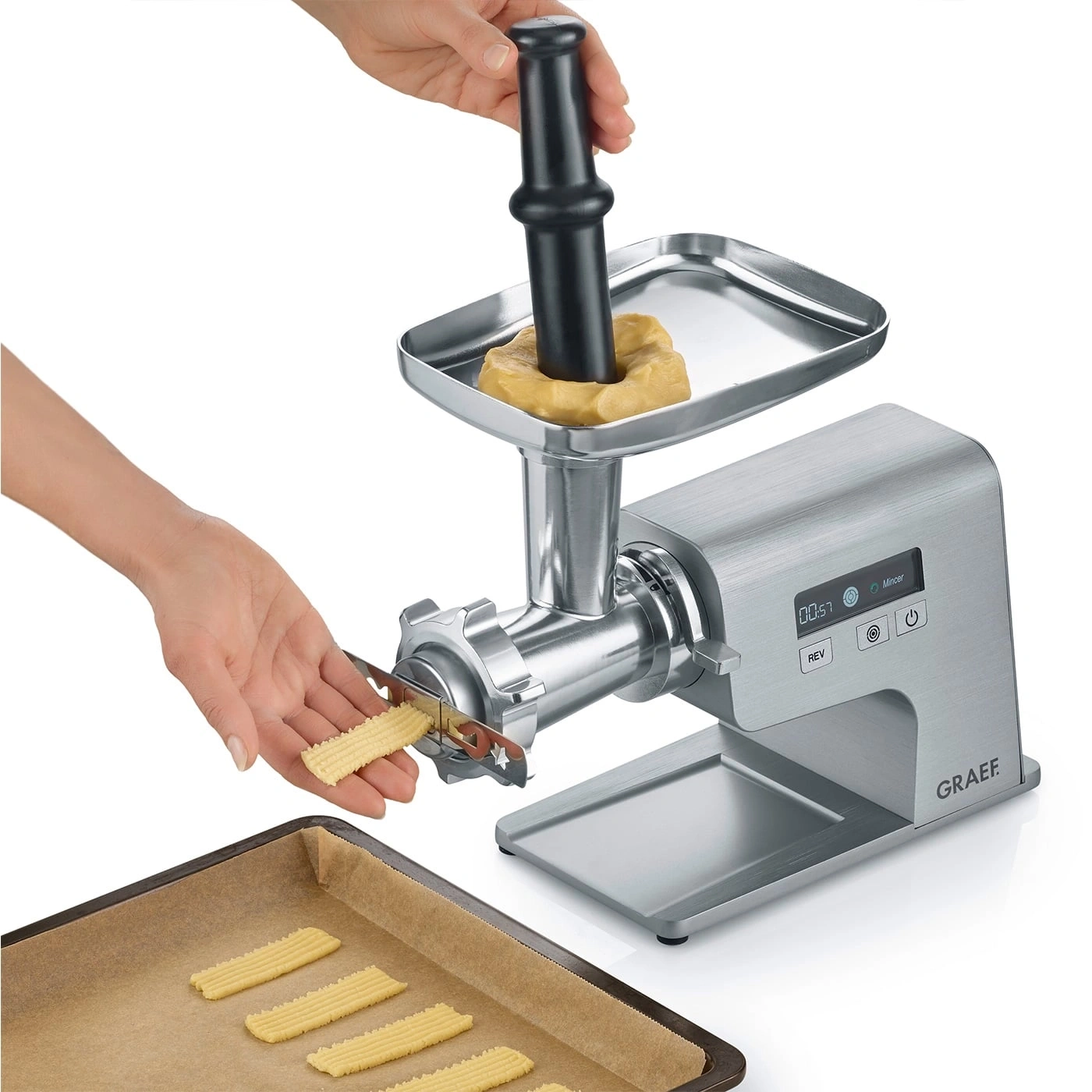 Meat grinder with dough, hands, baking sheet, GRAEF, kitchen, food, stainless steel