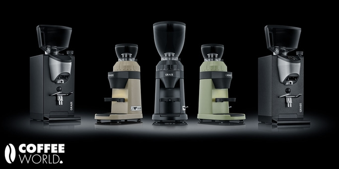 Coffee grinders in various colors against a black background.