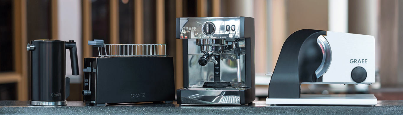 Graef kitchen appliances: kettle, toaster, espresso machine and slicer on a countertop