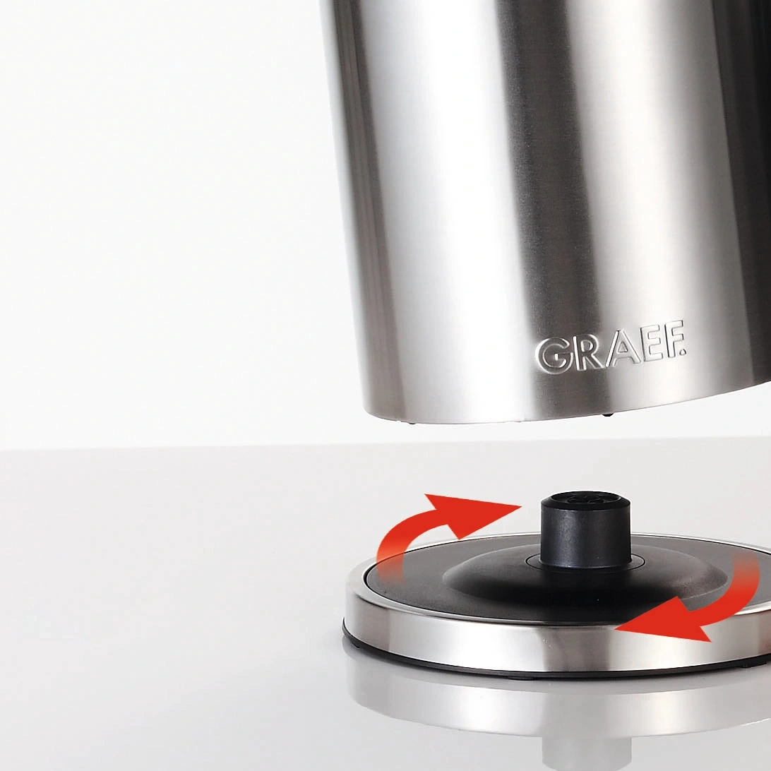 Stainless steel kettle with rotating base and arrows indicating rotation, GRAEF logo visible.